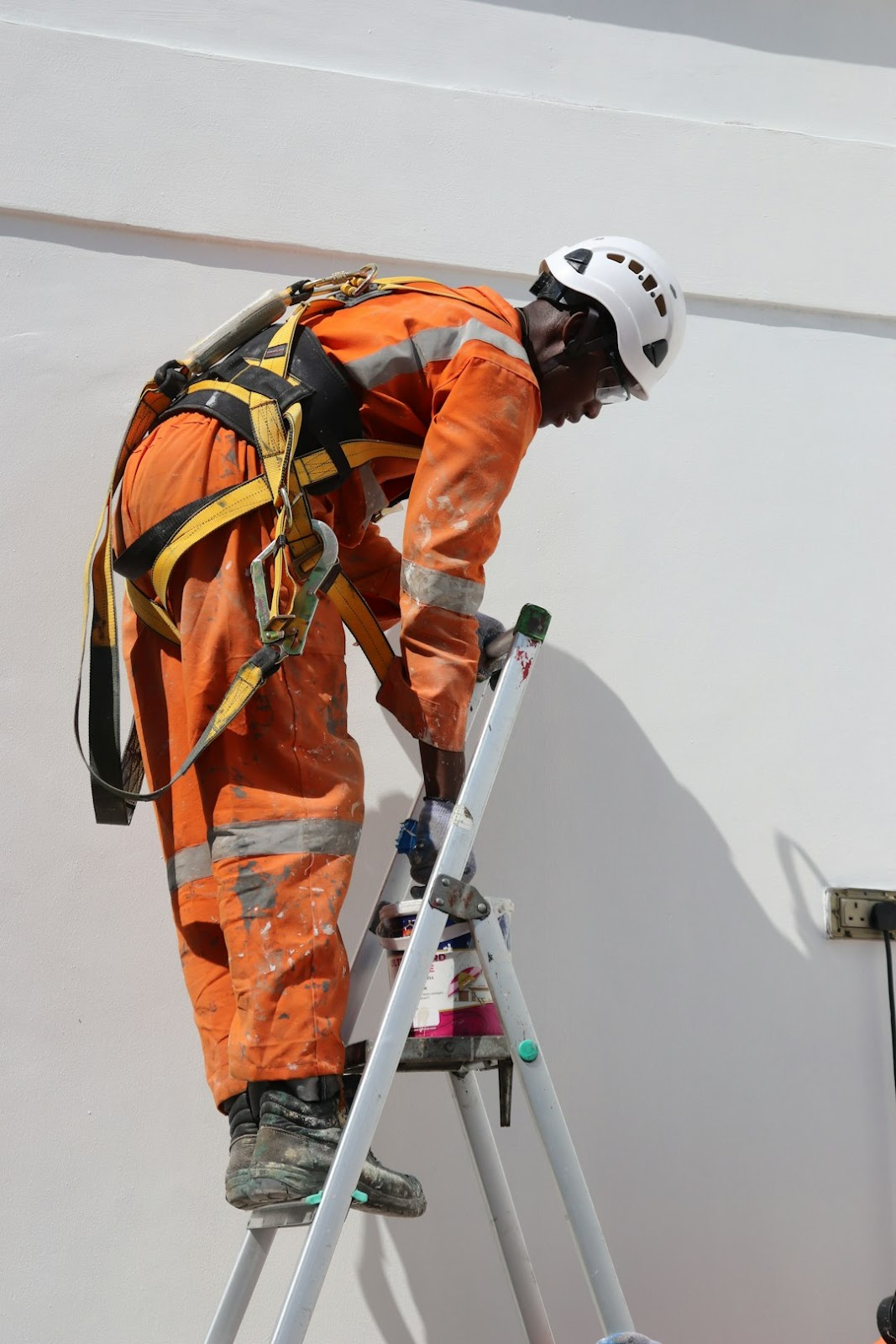 Painters wearing safety gear